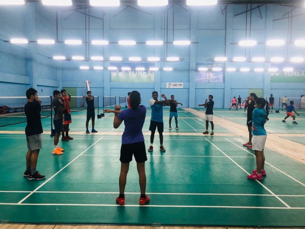 Badminton coaching in action